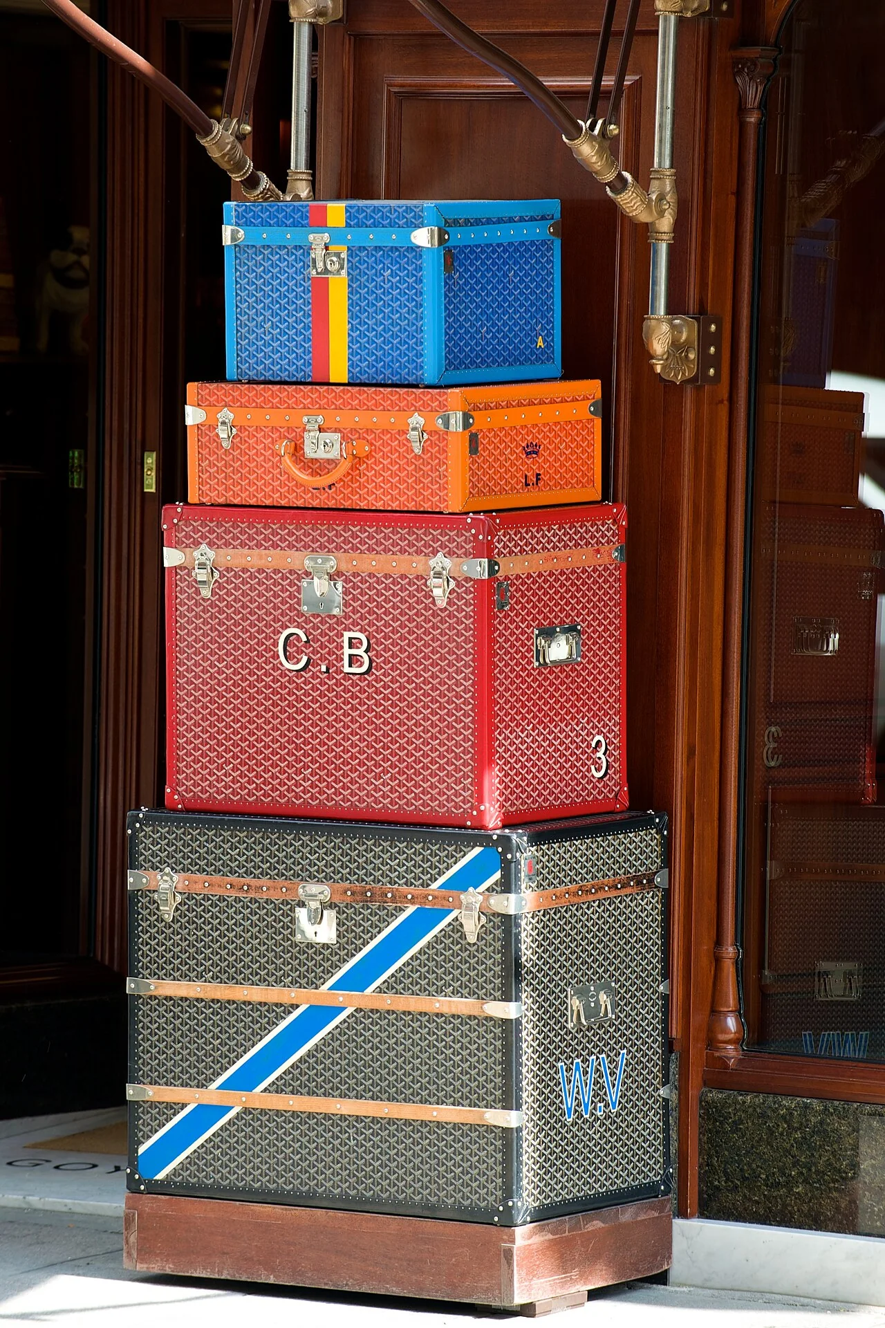 Painted Goyard trunks stacked at the rue Saint-Honoré boutique in Paris